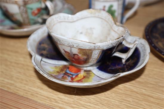 A group of Dresden cup saucers and covers, a Russian tea cup and other Continental porcelain cups